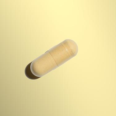 Curcuma Pill in yellow background